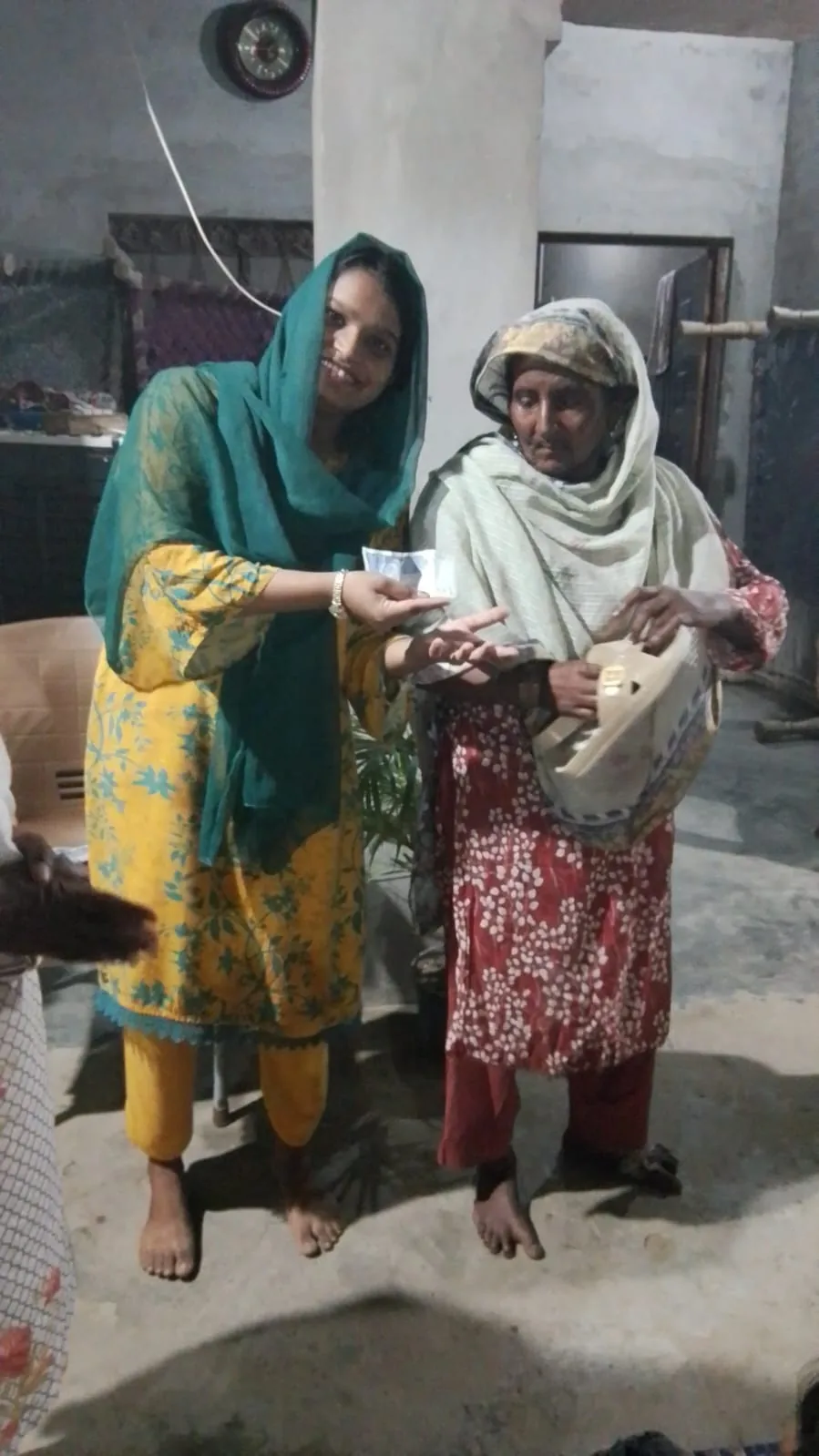 Community support being shared during a visit in Pakistan
