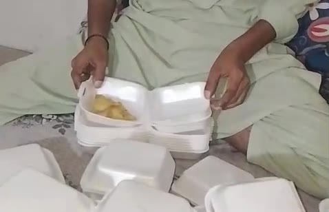 Meal containers being prepared video thumbnail