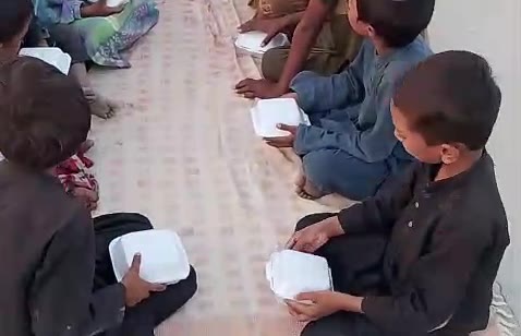 Meals shared during a community visit video thumbnail